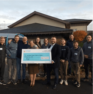Staff presenting cheque to LauralLynn